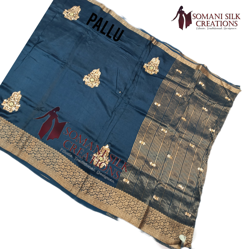 Teel blue saree with calcutta embroidery and contrast heavy work blouse