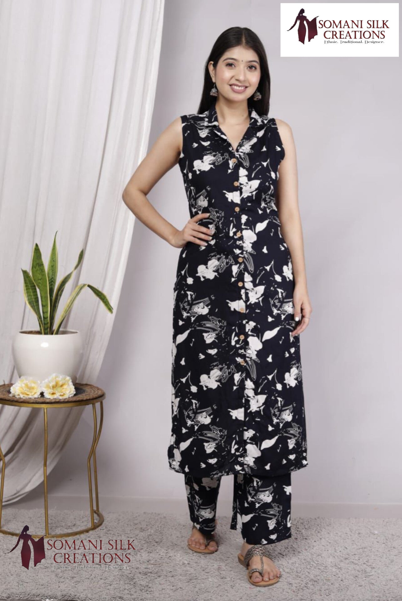 black color sleeveless palazzo suit
