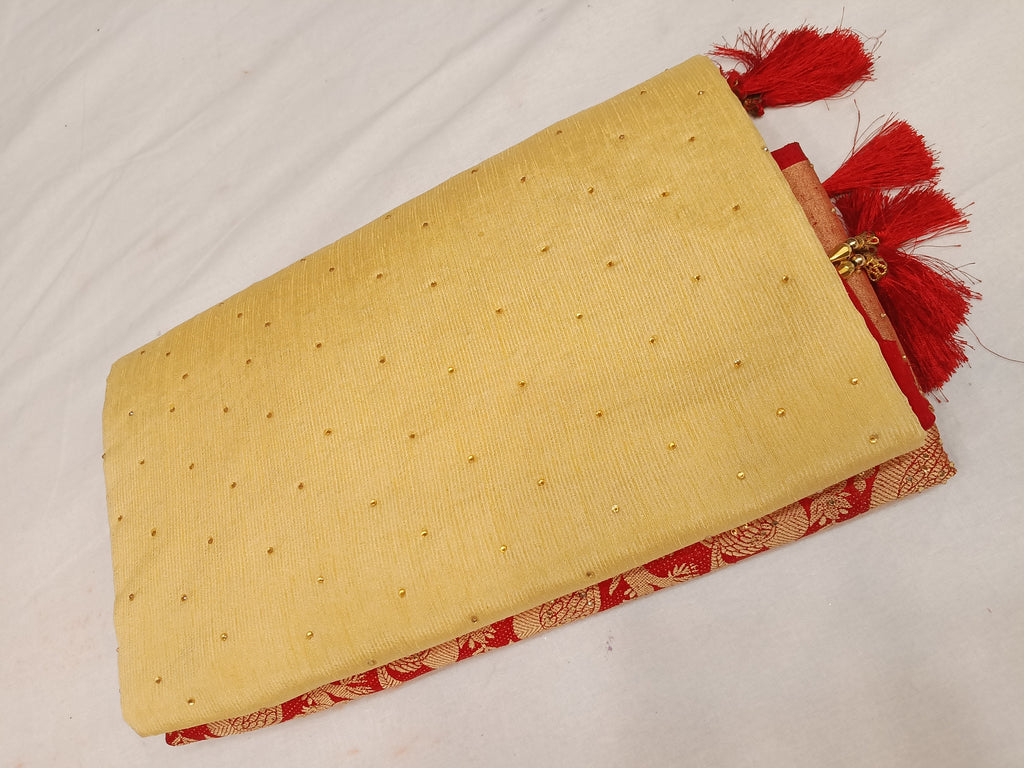 Off white cream and red color saree with stone work